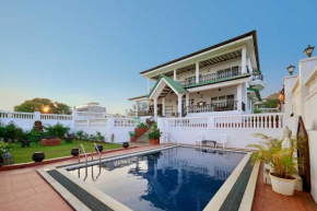Ananda Villa by StayVista - A serene escape with Mountain-view, Heritage interiors, Swimming pool & Lush lawn